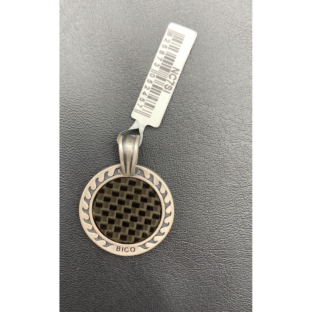 NWT Bico Carbon Fiber Sun Pendent With Black Cord Necklace Included